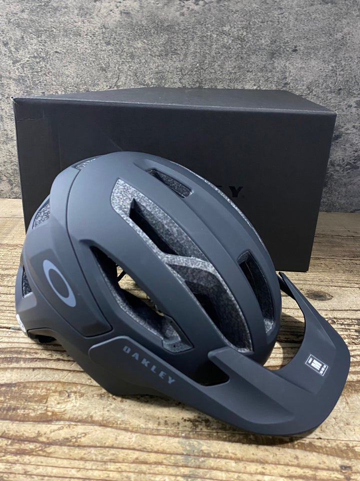 KN285 オークリー OAKLEY DRT TRAIL ASIAN ヘルメット 黒 M (2023/10)