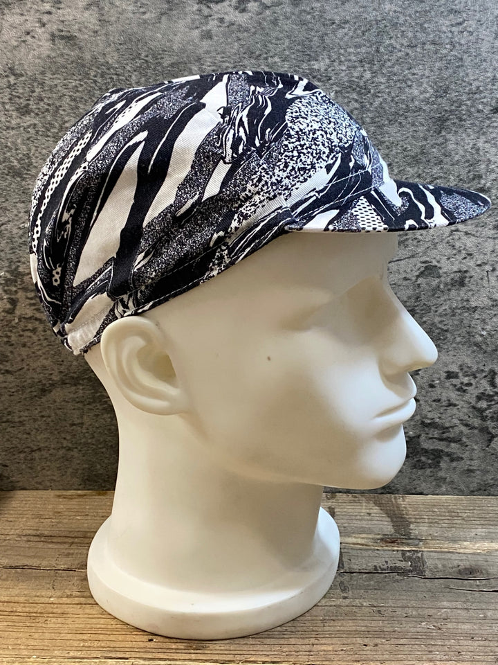 KH120 ラファ Rapha RCC + BRAULIO AMADO CAP サイクルキャップ 白 黒 ONESIZE