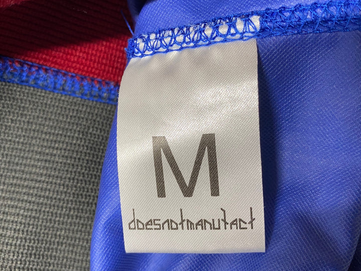 KB033 ダズノットマニファクト doesnotmanufact 長袖 ウィンドブレーカー ピステ 青 M