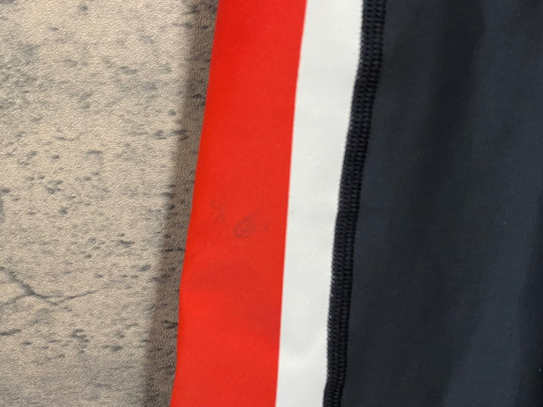 KC996 ルコックスポルティフ le coq sportif レーサーパンツ 黒赤白 L