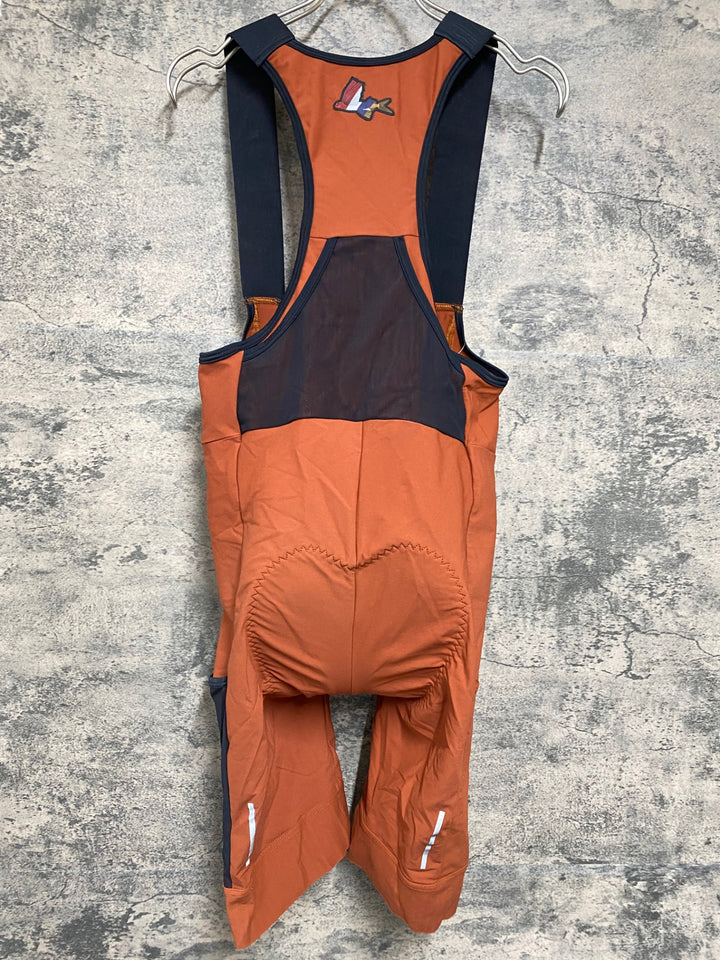 JY617 カフェドシクリステ CAFE DU CYCLISTE EVA カーゴ ビブショーツ オレンジ L