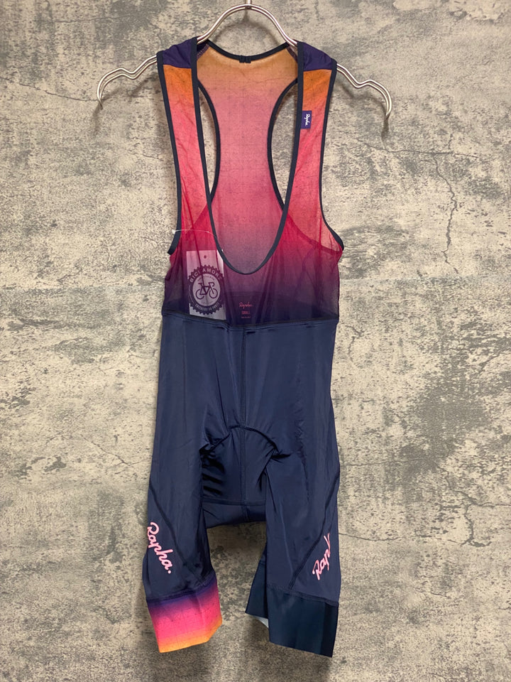 JX637 ラファ Rapha ODE TO THE SUN SOUPLESSE FLYWEIGHT BIB SHORTS 紺オレンジ レディース S