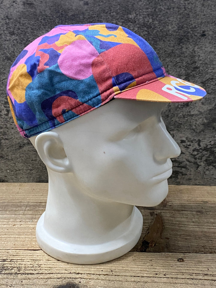 KH622 ラファ Rapha GEOFF MCFETRIDGE X RCC CAP サイクルキャップ ピンク 紺 総柄 ONE SIZE
