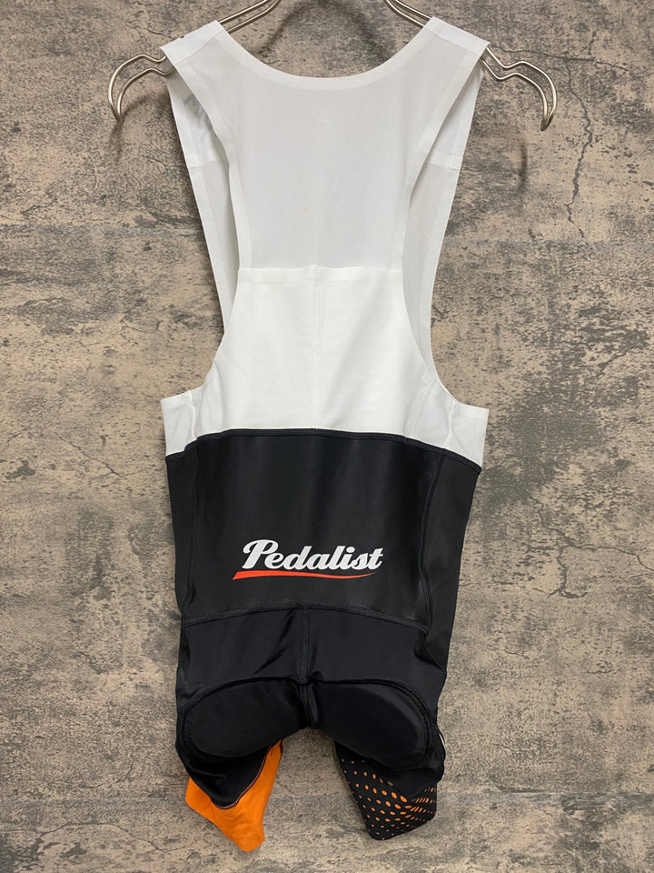 JW456 ラファ Rapha MEN'S PRO TEAM BIB SHORTS ビブショーツ 黒 オレンジ M Pedalist PINARELLO