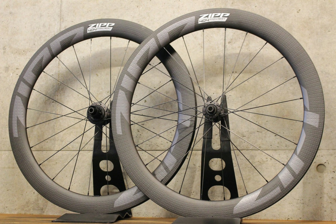 未使用品 ジップ ZIPP 404 ファイヤークレストディスク Firecrest Tubeless Disc シマノ 12/11S カーボン フックレス チューブレス ホイールセット 23C 【福岡店】