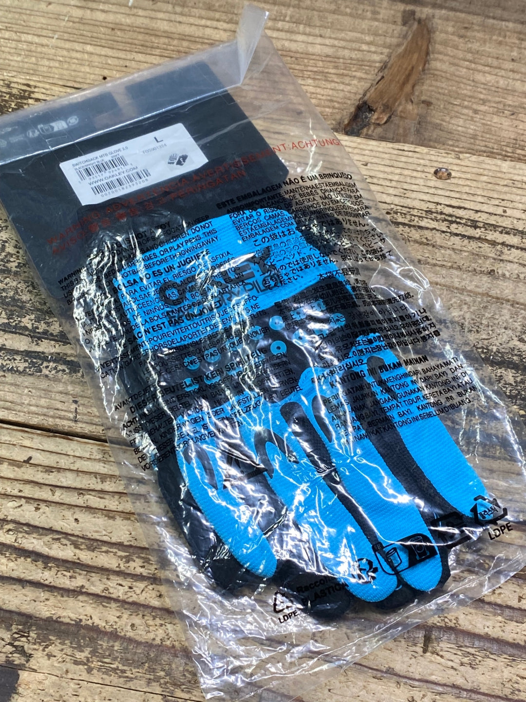 JN151 オークリー OAKLEY 長指 グローブ 黒 水色 L