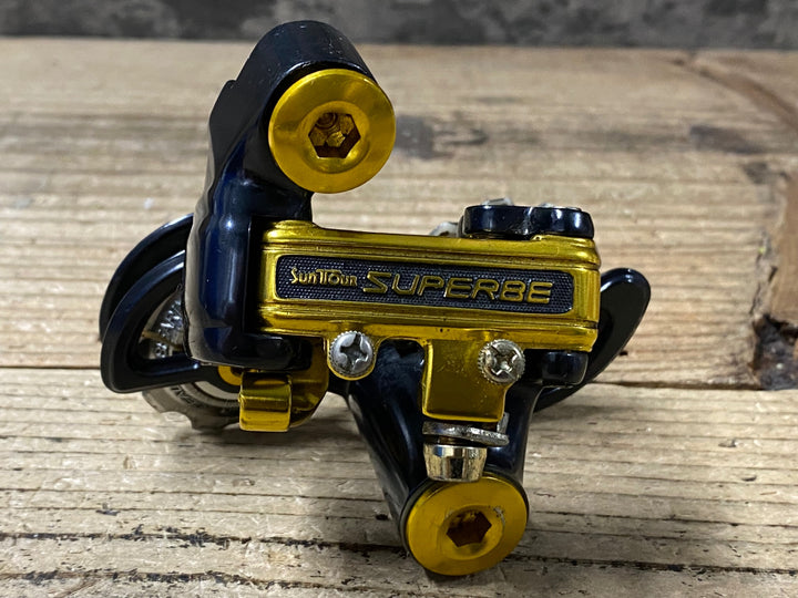 KL867 サンツァー SunTour Superbe pro 3100 リアディレイラー ブラック ゴールド ※プーリー割れのためジャンク